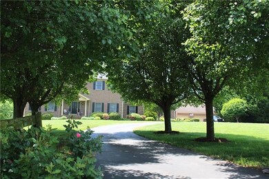 Lovely driveway in to this stately home.