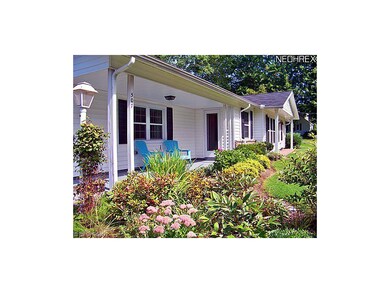 FRONT PORCH AND GARDENS