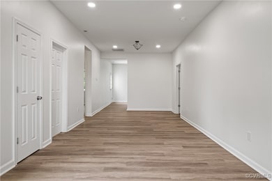 Living room featuring recessed lighting and light