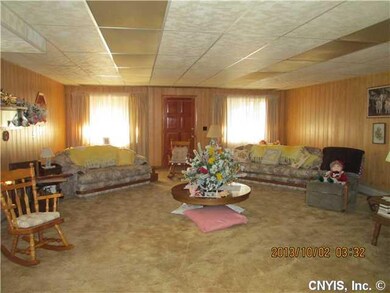 Living Room. 225 West Fifth St.