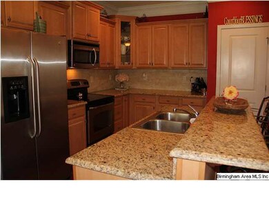 Picture perfect kitchen with granite counters, bre