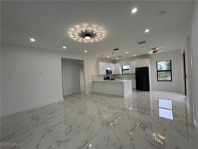 Unfurnished living room with sink
