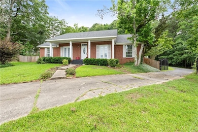 View of front of property with brick siding