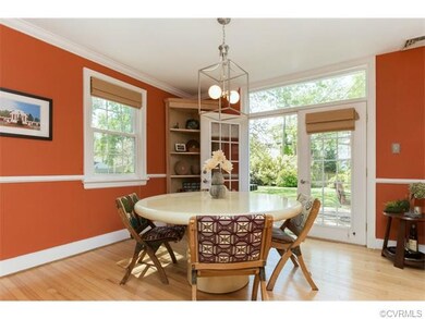 Open French door with view of the beautiful backya