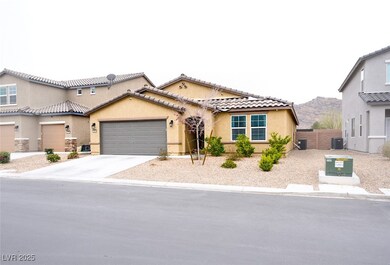 Mediterranean / spanish home with driveway, a moun