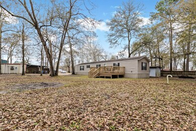The Primary Suite offers an ensuite bath with garden tub and separate shower.  You will love entertaining guest on the big front deck.  This PROPERTY OFFERS YOU LOTS OF FLEXIBILITY.  You can use this as a residential or commercial property.  It is convenient to 105, I69, I45, and 99.  Call today for your private tour!