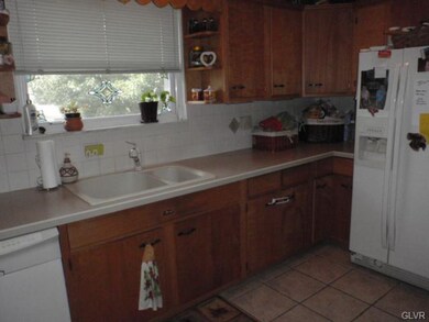 Another kitchen view, updated deep sink, refrigera