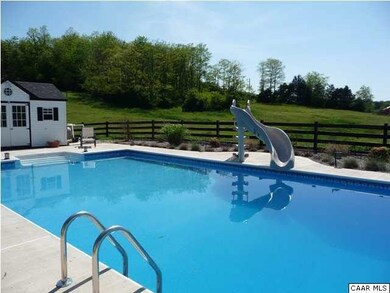 The pool now has a mesh cover over it. The photo h