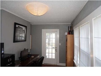 Office just off the Family Room with a Wall of Win
