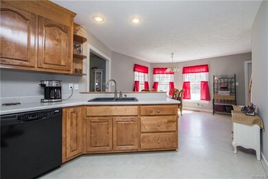Kitchen looking to eat-in area.