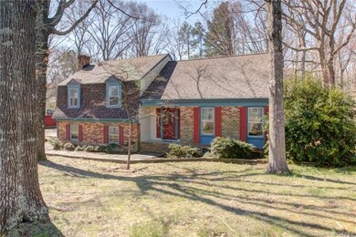 Mature Hardwoods and Landscaping on Over a Half Ac