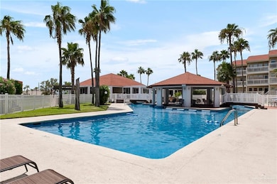 Pool with fence, a patio area, and a gazebo