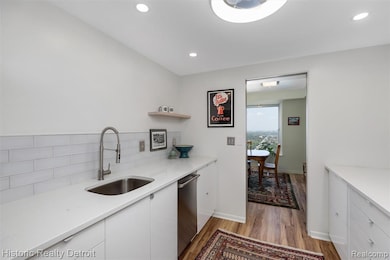 1300 E. Lafayette #2407 — Elevated City Living with Iconic Views.  Perched high on the 24th floor of Detroit’s iconic 1300 East Lafayette Cooperative, this 1,664 sqft corner residence embodies the best of modern city living. Recently reimagined with 