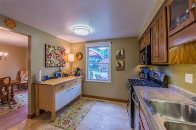 Kitchen with a view of the deck.  Canopy on deck i