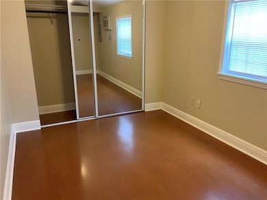 Bedroom #2: Also light filled...great storage ..ceiling fan and wall unit for heating and cooling. Washer/dryer hookups in this bedroom...Main house has SHARED  coin-operated washer/dryer.