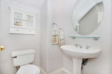 Half Bathroom with updated vanity, fixtures and li