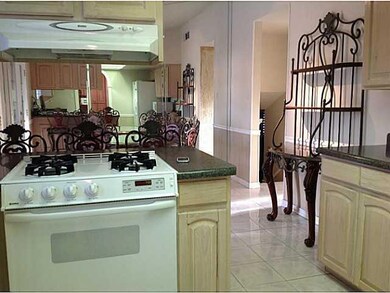 All white kitchen appliances will convey