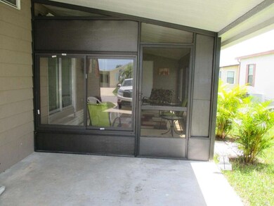 CARPORT/GLASS ROOM