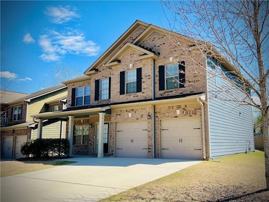 View of front of property featuring brick siding, 