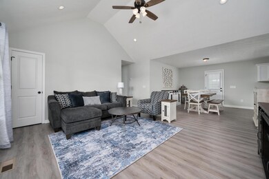 The living area leads into the dining area perfect for intimate family meals! 603 Anna's Way Lewisburg, TN 37091