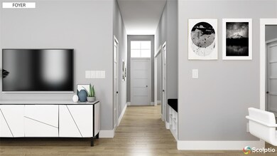Foyer entrance with light wood-type flooring