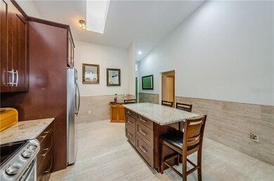 Skylight Kitchen with abundant cabinet drawer and 