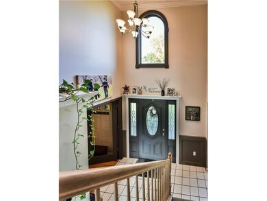LIGHT AND BRIGHT TWO STORY ENTRY FEATURING CERAMIC