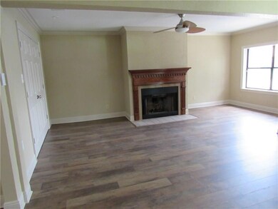 Family room with wood burning fire place