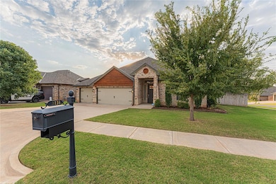 View of front of home featuring a garage and a fro