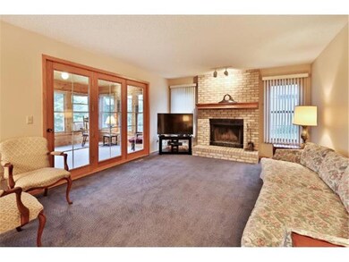 The large main floor family room includes a cozy w