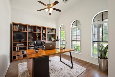 Office/Study with ceiling fan, vaulted ceiling, an