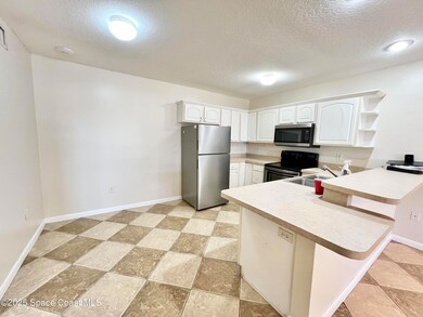22 Tulip Ave unit 330, Cocoa Beach, FL 32931 - photo 3