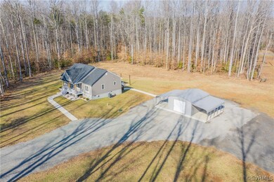 Aerial view of the home and the garage.