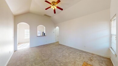 Living room featuring lofted ceiling and brand new