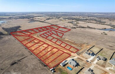 Birds eye view of property with a rural view