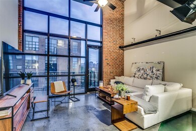 Living room featuring floor to ceiling windows, ce