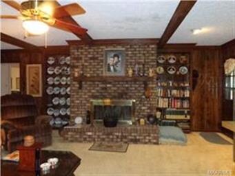 Another view of fireplace and great room.