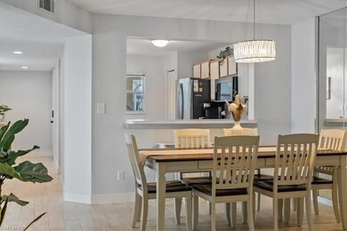 Dining area featuring a chandelier and recessed lighting