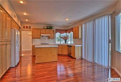 Sliding doors lead to very private backyard.