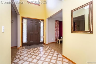 FANTASTIC LAYOUT ON MAIN LEVEL WITH A 2 STORY FOYER ENTRY!