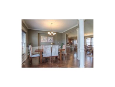 Simulated Photo. Formal Dining w/ handscraped hard