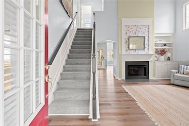 Stairs lead up to 2nd and 3rd bedrooms