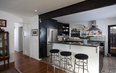 Kitchen island serves as additional entertaining s
