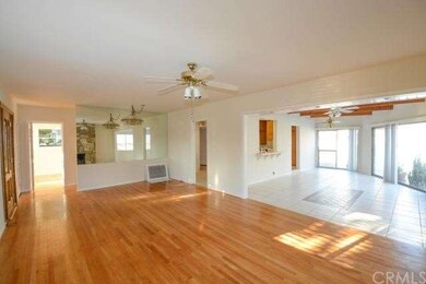 Open family and dining room with real hardwood flo