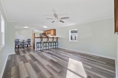 Unfurnished room featuring hardwood / wood-style f