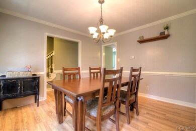 Formal dining room with crown & chair rail molding