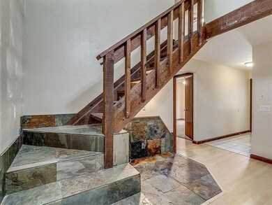 Staircase featuring wood-type flooring