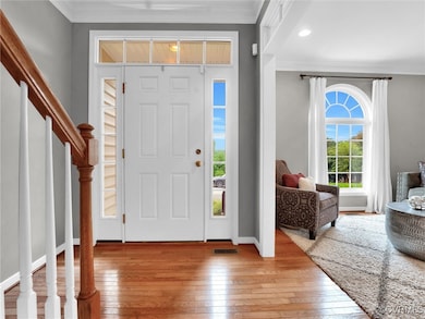 Foyer featuring light hardwood / wood-style floori