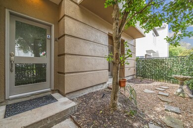 Your private gated entry and modern glass front do