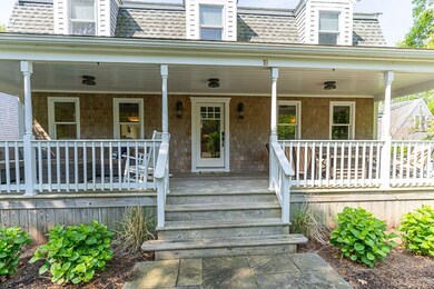 Extra summer living space on an over sized front porch.